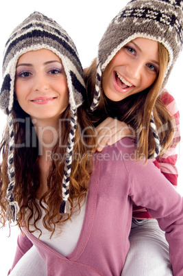 two girls showing happiness together
