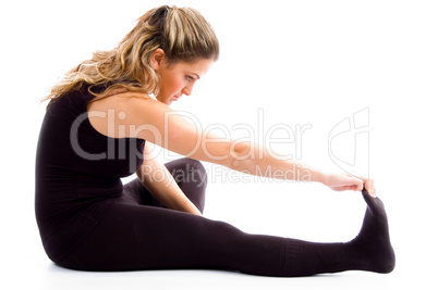 side pose of exercising female