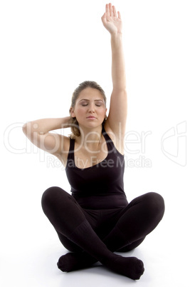 young female doing yoga