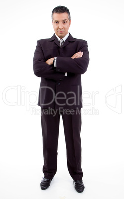front view of smiling businessman with crossed arms