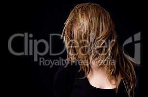 portrait of woman hiding her face with hair