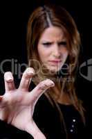 portrait of beautiful female showing hand gesture