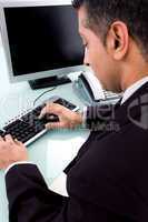 back pose of businessman working on computer