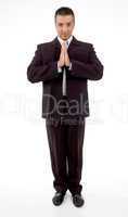 front view of praying adult businessman