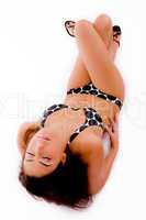 top view of laying sensuous female