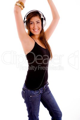 side view of young woman enjoying music