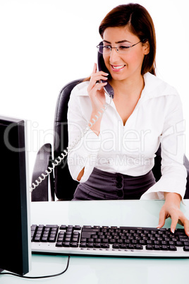 front view of businesswoman busy on phone