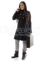 smart model busy on call and holding leather bag