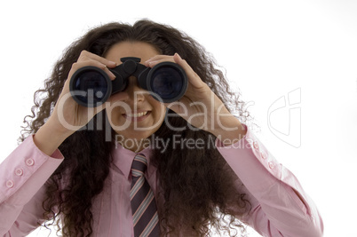 young corporate woman viewing through binoculars