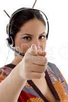 call center female wearing headphone pointing at camera