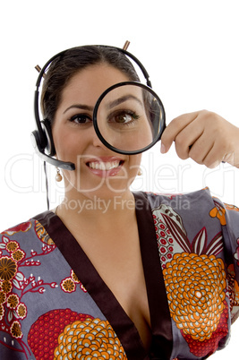 japanese female looking through magnifying lens