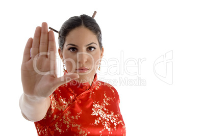 female showing stopping hand gesture