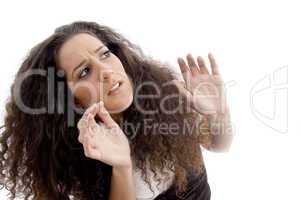 latin american female surprised after looking upwards