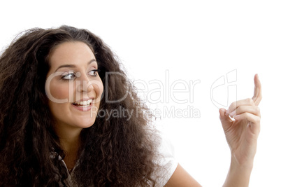 close up view of beautiful woman pointing upwards