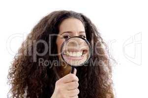 funny woman showing her magnified teeth