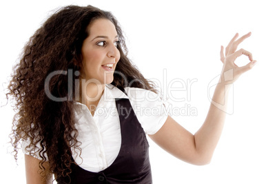 cute woman showing okay hand gesture