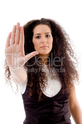 beautiful woman posing with stopping palm