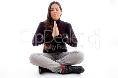 sitting praying young female