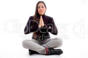 sitting praying young female