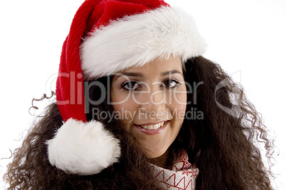 close view of young woman wearing christmas hat