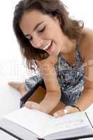 smiling young student reading book