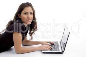 laying woman with laptop