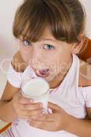 girl going to drink milk