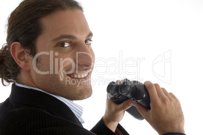 cheerful handsome lawyer holding a pair of binoculars