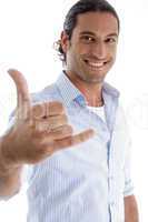 smiling man with hand gesture