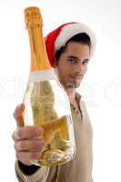 young guy celebrating christmas with wine
