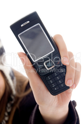 young girl's hand showing mobile phone