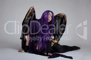girl sit in purple fury cosplay costume character