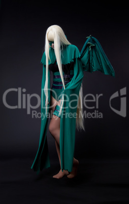 blond girl in green fury cosplay character