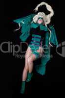 young blond girl in green banshee cosplay costume