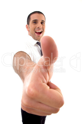 handsome young businessman with thumbs up