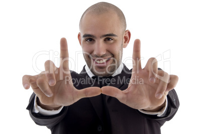 young corporate man posing hands like frame
