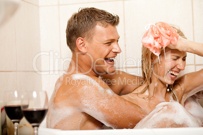 Young couple bathing