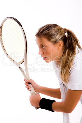 side pose of young tennis player