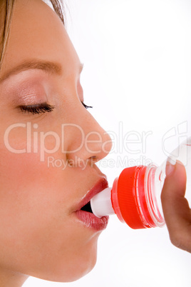 close up of woman drinking water