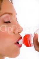 close up of woman drinking water