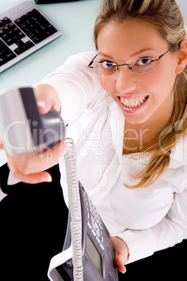 top view of smiling businesswoman offering call