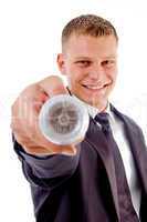 handsome young executive holding electric bulb smiling