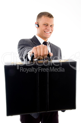 young corporate showing his briefcase