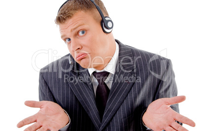 confused businessman posing with headset