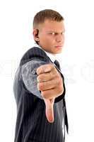 businessman showing thumbs down