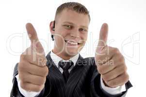 successful executive with thumbs up hand gesture