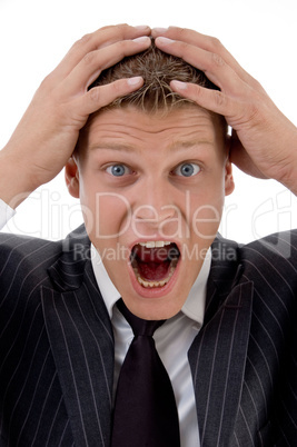 surprised businessman holding his head