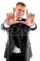 happy successful business man making frame with hand gesture