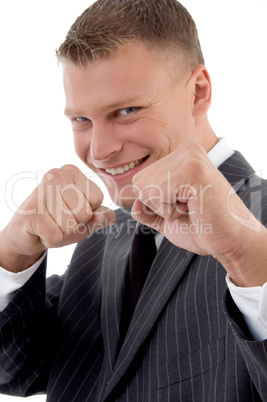 smiling professional showing boxing gesture