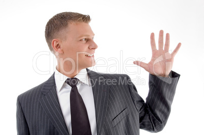 portrait of businessman counting fingers